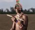 Young man in colourful traditional attire.